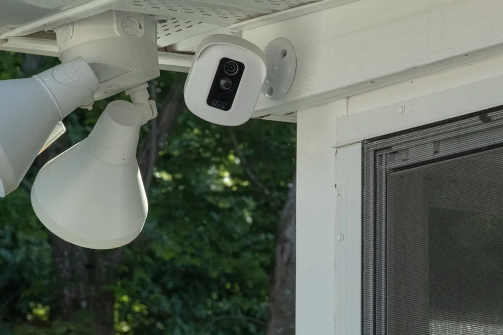 Surveillance camera mounted on building exterior for CCTV coverage